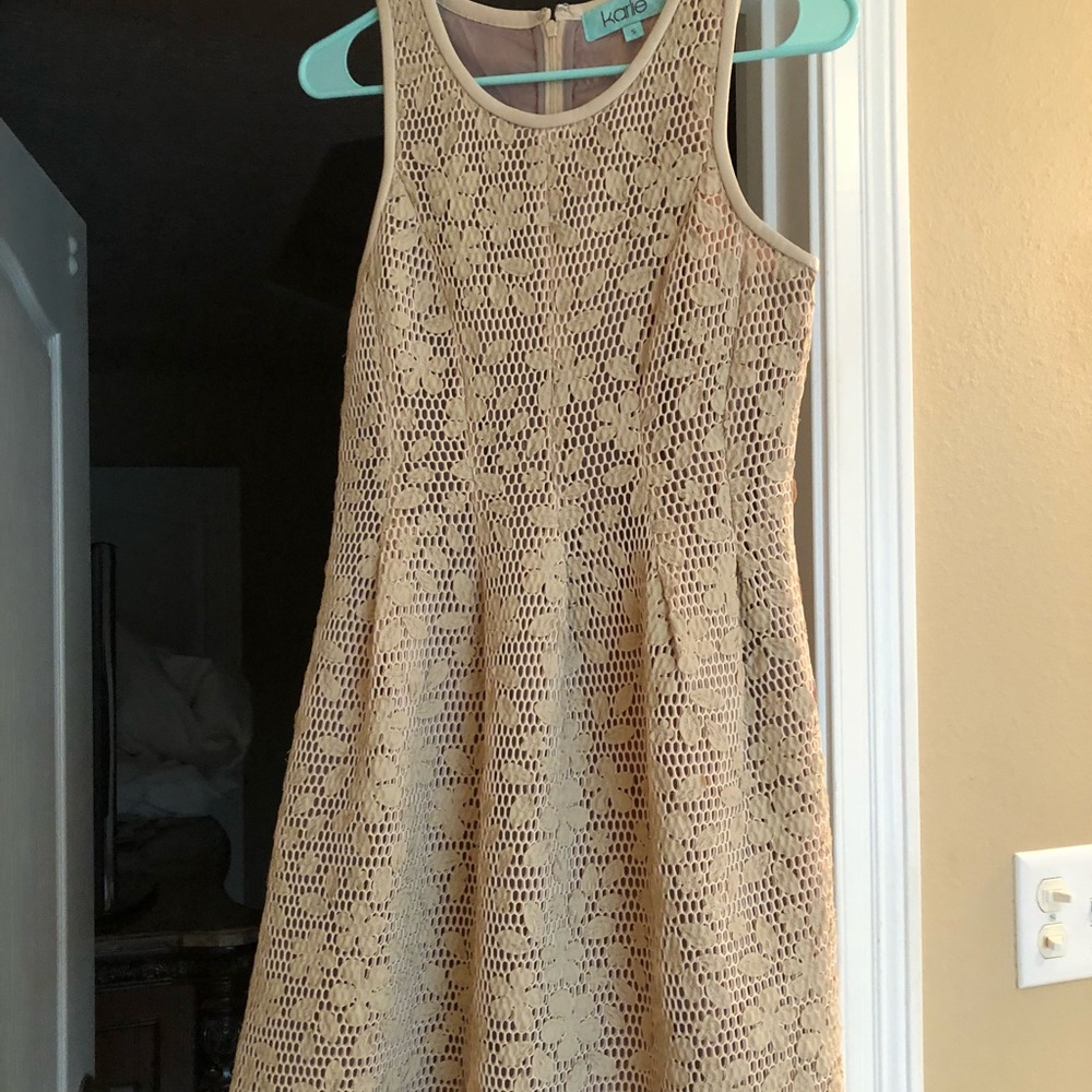 Tan “leather” dress.